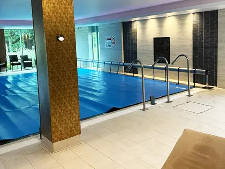 Lovely looking health club pool with a fixed Plastica manual reel system