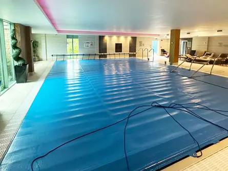 Health club swimming pool with a Plastica fixed manual reel system