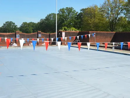 Outdoor Pool with a cover on it