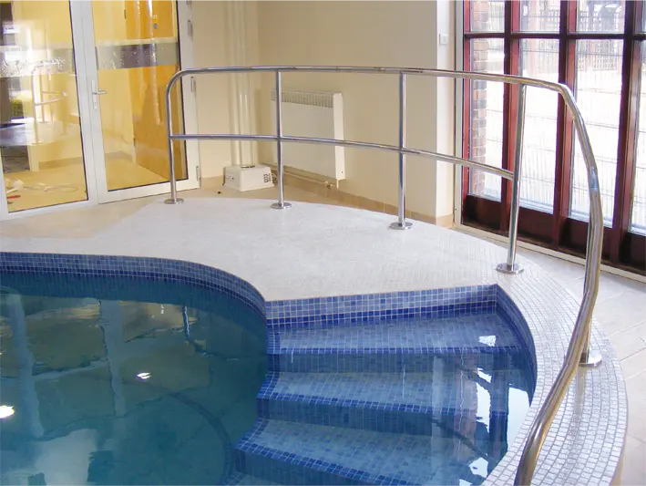 great looking handrail around a swimming pool